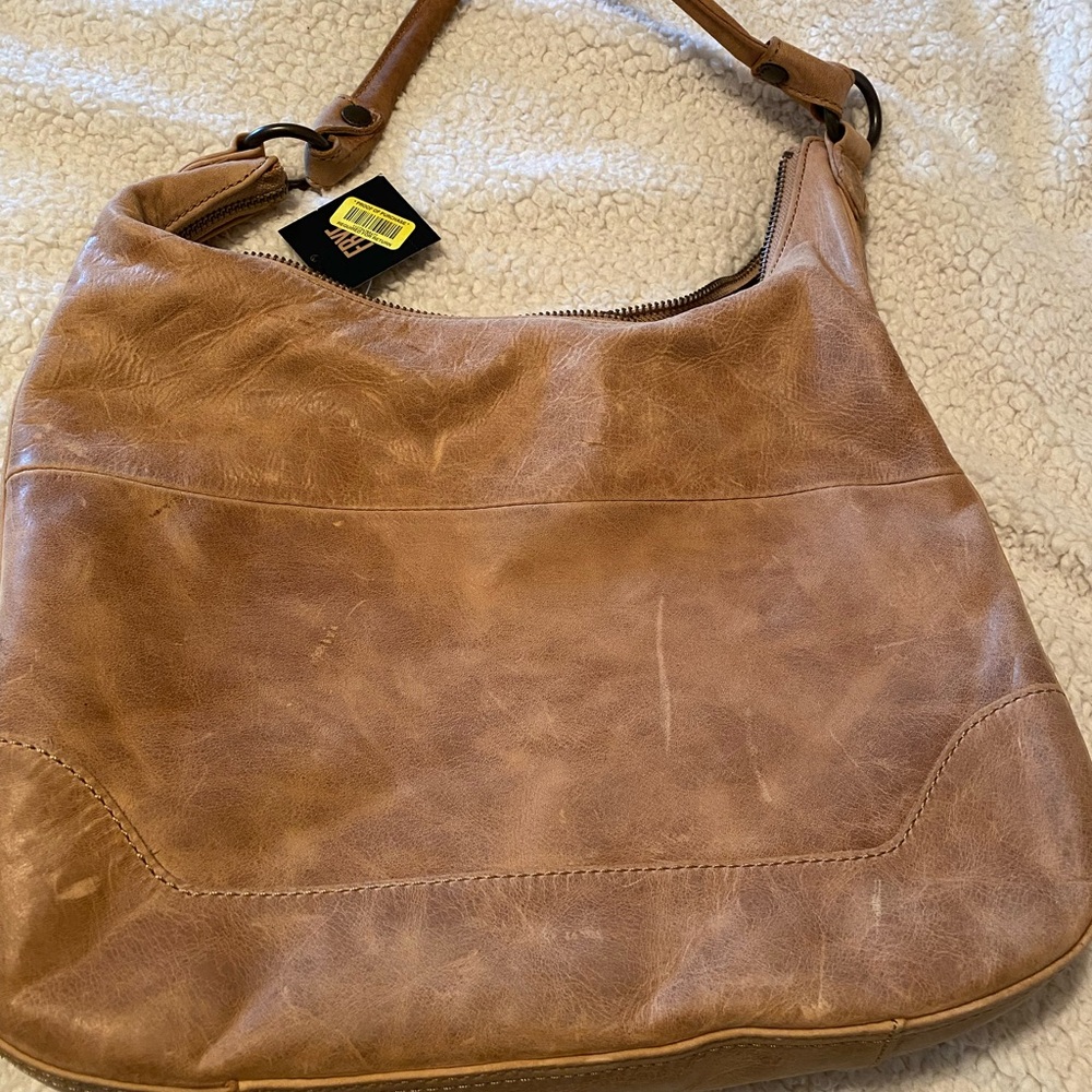 Beautiful Frye purse, never used, I paid the price it shows 398. - Picture 2 of 6